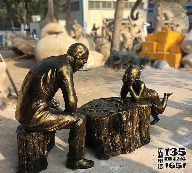 公園景區(qū)玻璃鋼仿銅下象棋的人物雕塑 公園景區(qū)玻璃鋼仿銅下象棋的人物雕塑